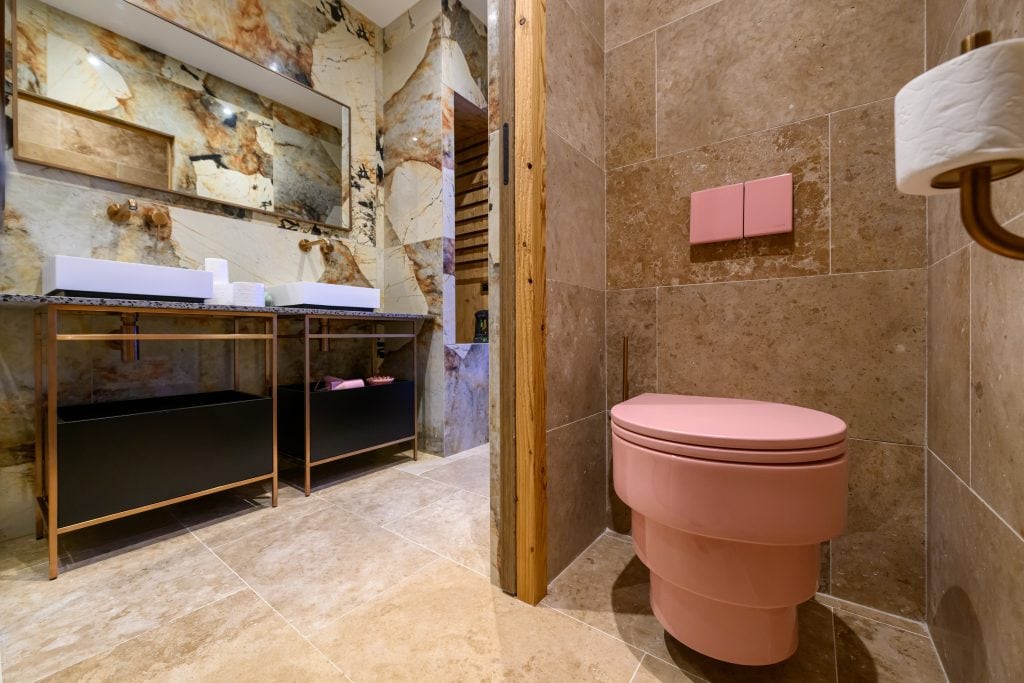 Luxurious bathroom at Stay Courchevel 1650 with modern sinks and stylish earthy tones.